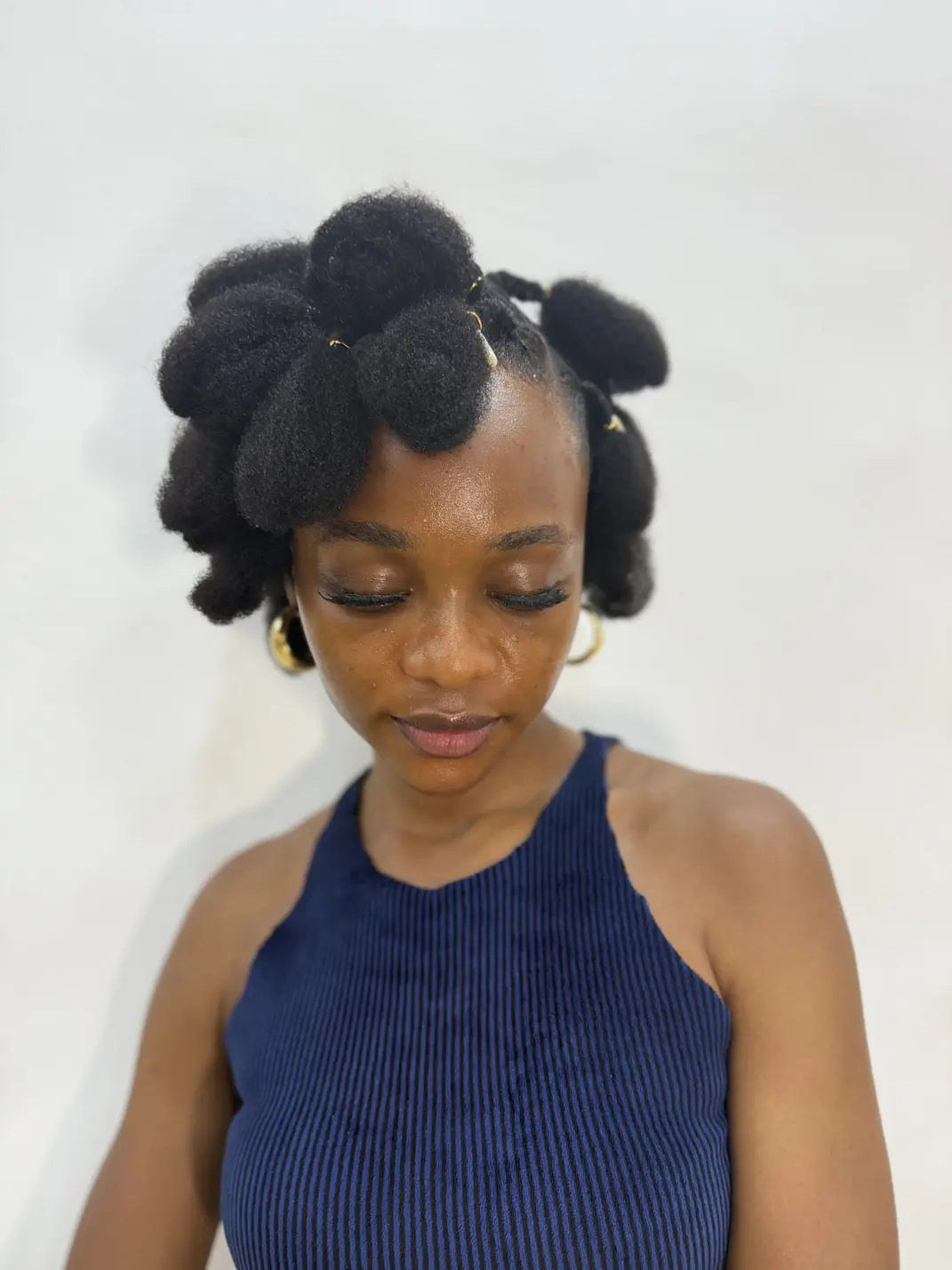 A client's natural 4C hair after a wash, conditioning and detangle